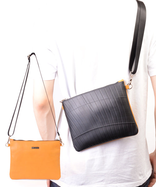 Reversible mini sakosh made of genuine leather