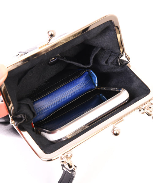 Kiss lock shoulder bag