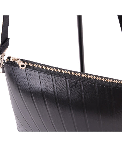 Reversible mini sakosh made of genuine leather