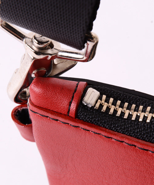 Reversible mini sakosh made of genuine leather